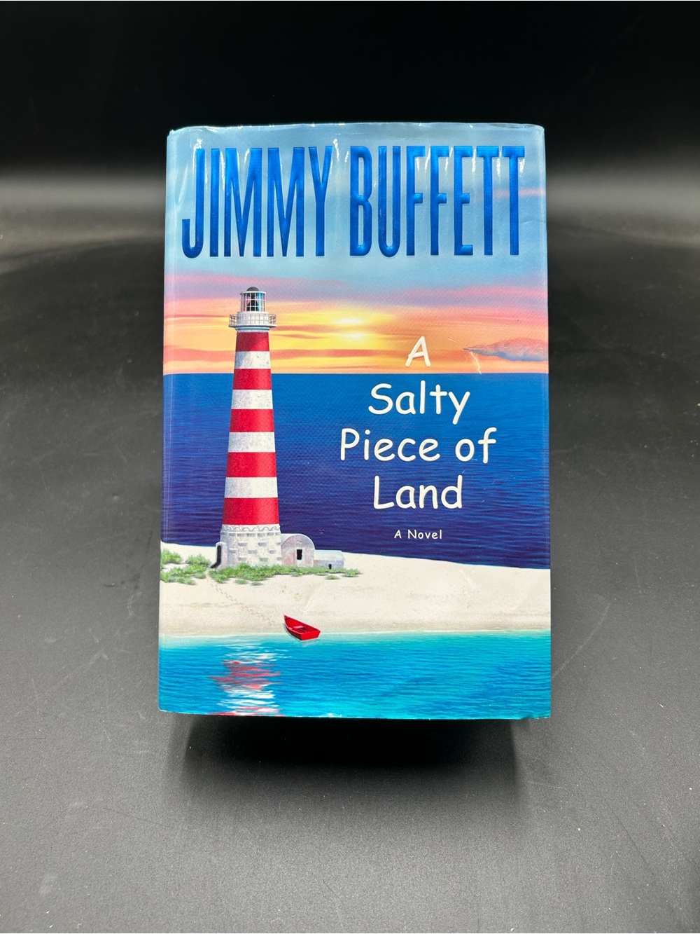 "A Salty Piece of Land" - Blue & Red Coastal Novel, Jimmy Buffett